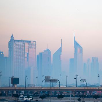 Dubai, UAE - 01.15.2021 Cityscape rising from the fog