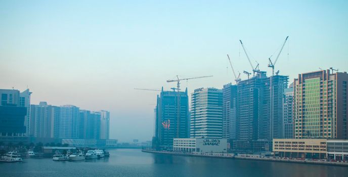 Dubai, UAE - 01.15.2021 Sunrise over a Dubai water canal