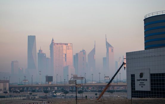 Dubai, UAE - 01.15.2021 Cityscape rising from the fog