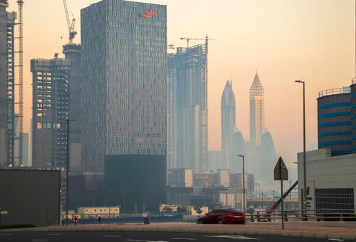 Dubai, UAE - 01.15.2021 Cityscape rising from the fog