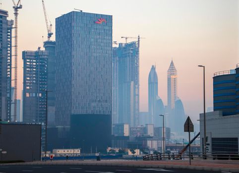 Dubai, UAE - 01.15.2021 Cityscape rising from the fog