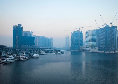 Dubai, UAE - 01.15.2021 Sunrise over a Dubai water canal