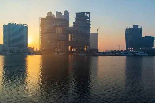 Dubai, UAE - 01.15.2021 Sunrise over a Dubai water canal