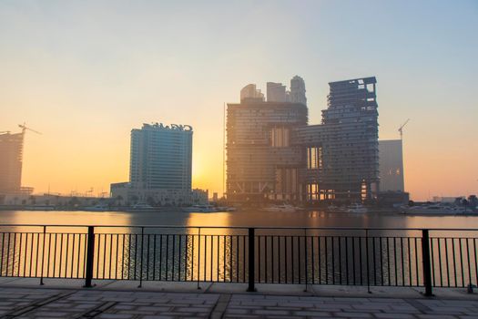 Dubai, UAE - 01.15.2021 Sunrise over a Dubai water canal