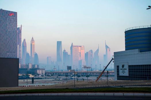 Dubai, UAE - 01.15.2021 Cityscape rising from the fog