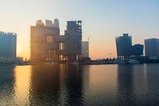 Dubai, UAE - 01.15.2021 Sunrise over a Dubai water canal
