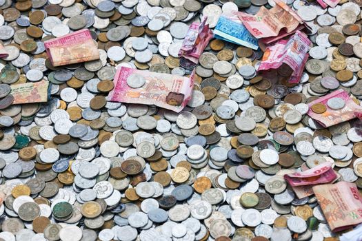 Sri Lanka's money. Background of Sri Lankan Rupee coins and banknotes. Financial crisis, money is depreciating.