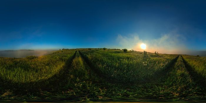 360 by 180 seamless degree full spherical panorama of misty summer morning meadow in eqirectangular projection