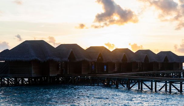 Shot of a over water bungalows on tropical island