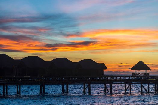 Shot of a over water bungalows on tropical island