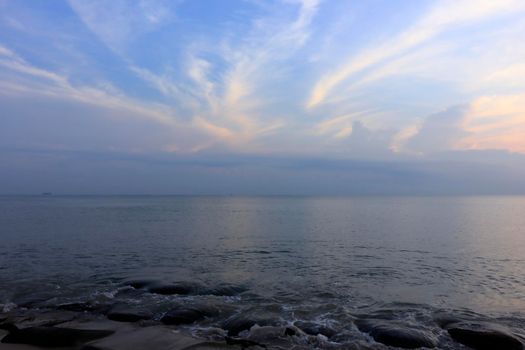 photograph of the sunrise from the sea and the beautiful sky and morning clouds