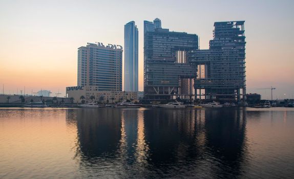 Dubai, UAE - 01.15.2021 Sunrise over a Dubai water canal