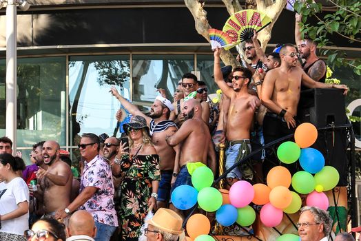 Benidorm, Alicante, Spain- September 10, 2022: People dancing and having fun at the Gay Pride Parade in Benidorm in September