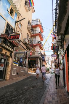 Benidorm, Alicante, Spain- September 10, 2022: Streets and facades adorned with colorful rainbow flags for The Gay Pride in Benidorm