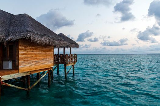 Shot of a over water bungalows on tropical island