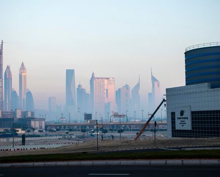 Dubai, UAE - 01.15.2021 Cityscape rising from the fog