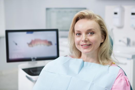 Close up of a lovey mature woman smiling after dental appointment