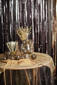Bright Christmas decor. Christmas and New Year interior in black and gold colors. Winter holiday background.