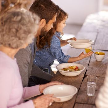 Starting the day the healthy way. a family having breakfast together