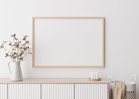 Empty horizontal picture frame on white wall in modern living room. Mock up interior in minimalist, contemporary style. Free space for your picture, poster. Console, cotton plant. 3D rendering