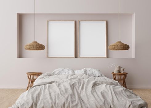 Two empty vertical picture frames on light gray wall in modern bedroom. Mock up interior in scandinavian, boho style. Free space for picture, poster. Bed, rattan lamps. 3D rendering