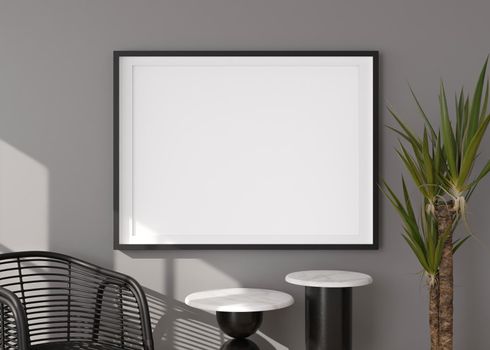 Empty horizontal picture frame on grey wall in modern living room. Mock up interior in contemporary style. Free, copy space for picture, poster. Chair, table, plant. Close up. 3D rendering