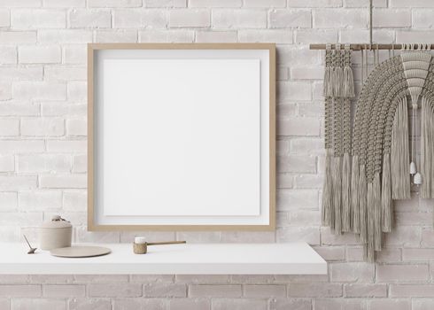 Empty square picture frame on white brick wall in modern room. Mock up interior in contemporary, boho style. Free, copy space for picture. Macrame. 3D rendering