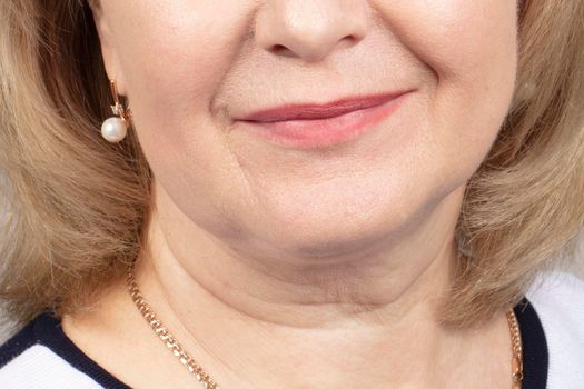 Furrowed lips of a mature woman.Signs of aging skin after 40