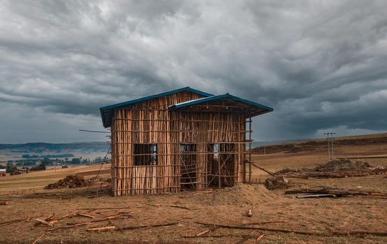 Traditional primitive farmer wooden farmhouse for cow in Amhara Region, Ethiopia