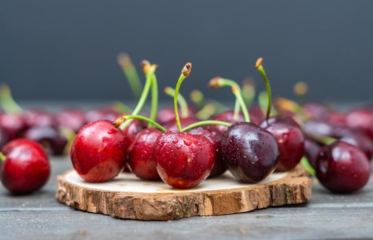 fresh red summer cherries with water drops