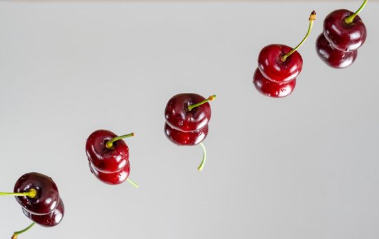 fresh red summer cherries with water drops