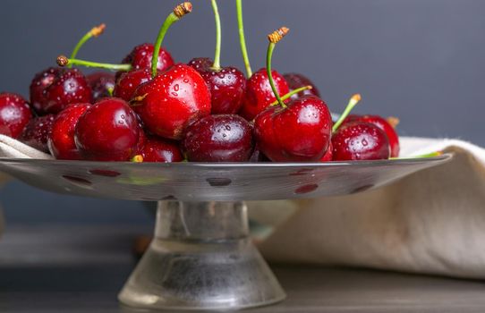 fresh red summer cherries with water drops