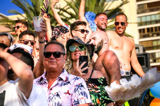 Benidorm, Alicante, Spain- September 10, 2022: People dancing and having fun at the Gay Pride Parade in Benidorm in September