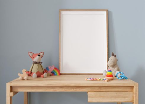 Empty vertical picture frame standing on the desk in modern child room. Frame mock up in contemporary style. Free, copy space for picture, poster. Plush and wooden toys. Close up view. 3D rendering