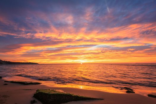 Amazing colorful sunrise over the sea.	