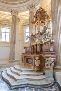 VENARIA REALE, ITALY - Circa January 2022: Baroque catholic church altar. Old interior religious building.