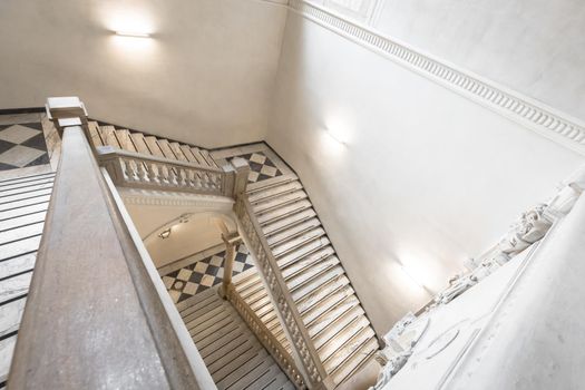 TURIN, ITALY - CIRCA MAY 2021: luxury staircase made of marble in an antique Italian palace