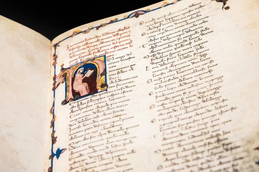 FLORENCE, ITALY - circa July 2021. Antique manuscript sheet from Dante Divine Comedy, 16th Century copy.
