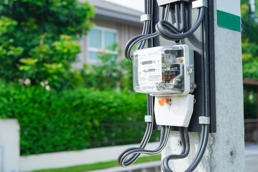Bangkok, Thailand - May 15, 2022 Electric measuring power meter for energy cost at home and office.