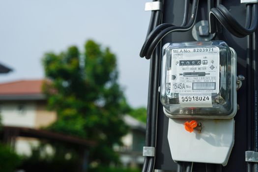 Bangkok, Thailand - May 15, 2022 Electric measuring power meter for energy cost at home and office.
