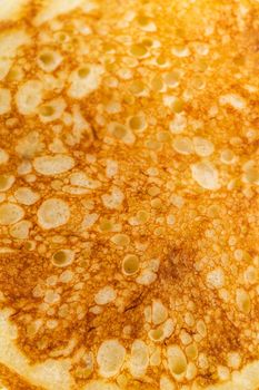 Trying coconut banana pancakes on a nonstick white frying pan.
