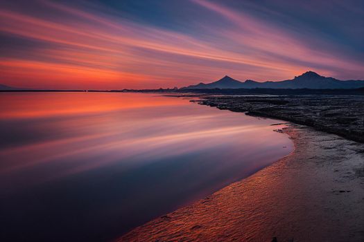 beautiful orange sunset on the shore of the beach. sunset sky.