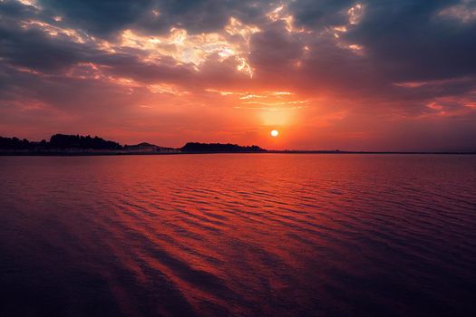 beautiful orange sunset on the shore of the beach. sunset sky.