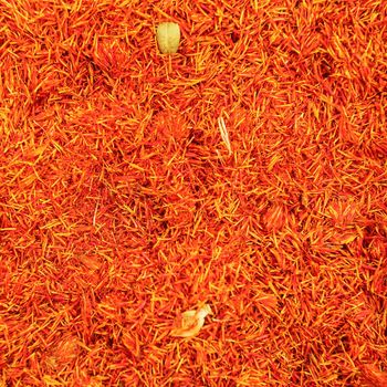 Top view, detail on bright orange red saffron (Crocus sativus) spice displayed on food market, Kyrenia, Northern Cyprus