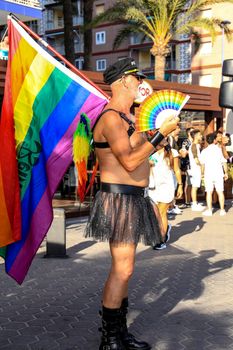 Benidorm, Alicante, Spain- September 10, 2022: People dancing and having fun at the Gay Pride Parade in Benidorm in September