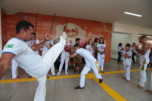 santana, bahia, brazil - september 13, 2022: capoeiristas fighting in a full-time state public school in the city of Santana.