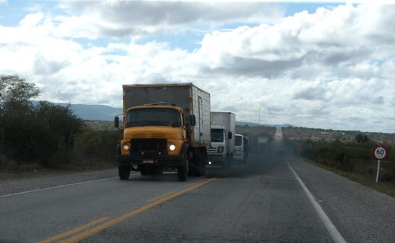 serra preta, bahia, brazil - september 13, 2022: truck traveling along the BA 052 highway in the city of Serra Preta.