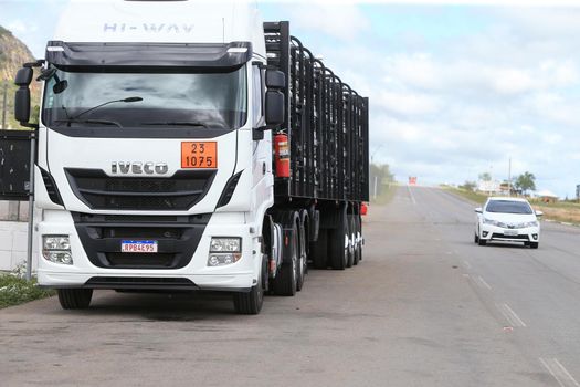 serra preta, bahia, brazil - september 13, 2022: truck traveling along the BA 052 highway in the city of Serra Preta.