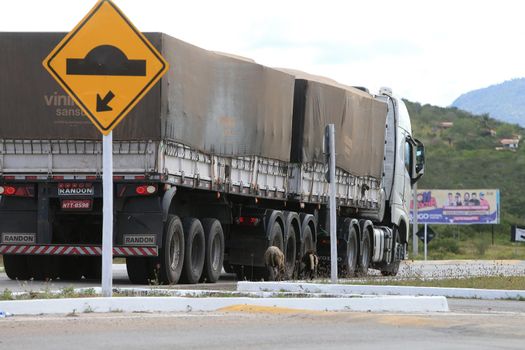 serra preta, bahia, brazil - september 13, 2022: truck traveling along the BA 052 highway in the city of Serra Preta.