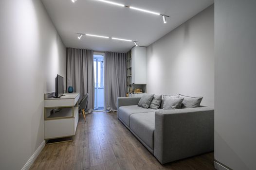 Cozy and luxury bedroom in shades of grey with elegant and modern details